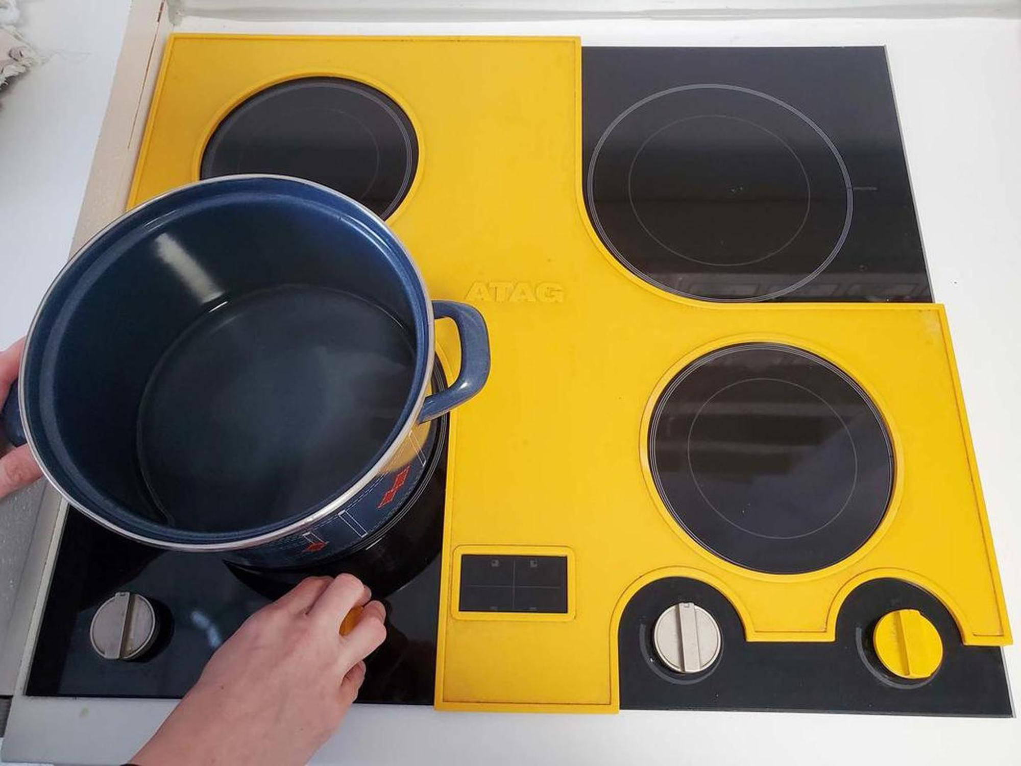 Podlaga za označevanje kuhalne površine za indukcijsko ploščo