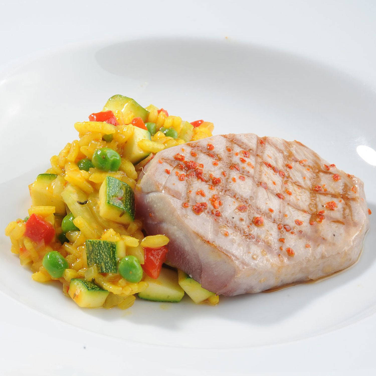 Serviervorschlag: Truthahnschnitzel auf Gemüsereis