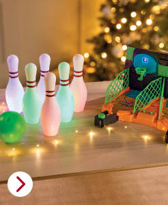 Glow-in-the-dark bowling set with toy launcher