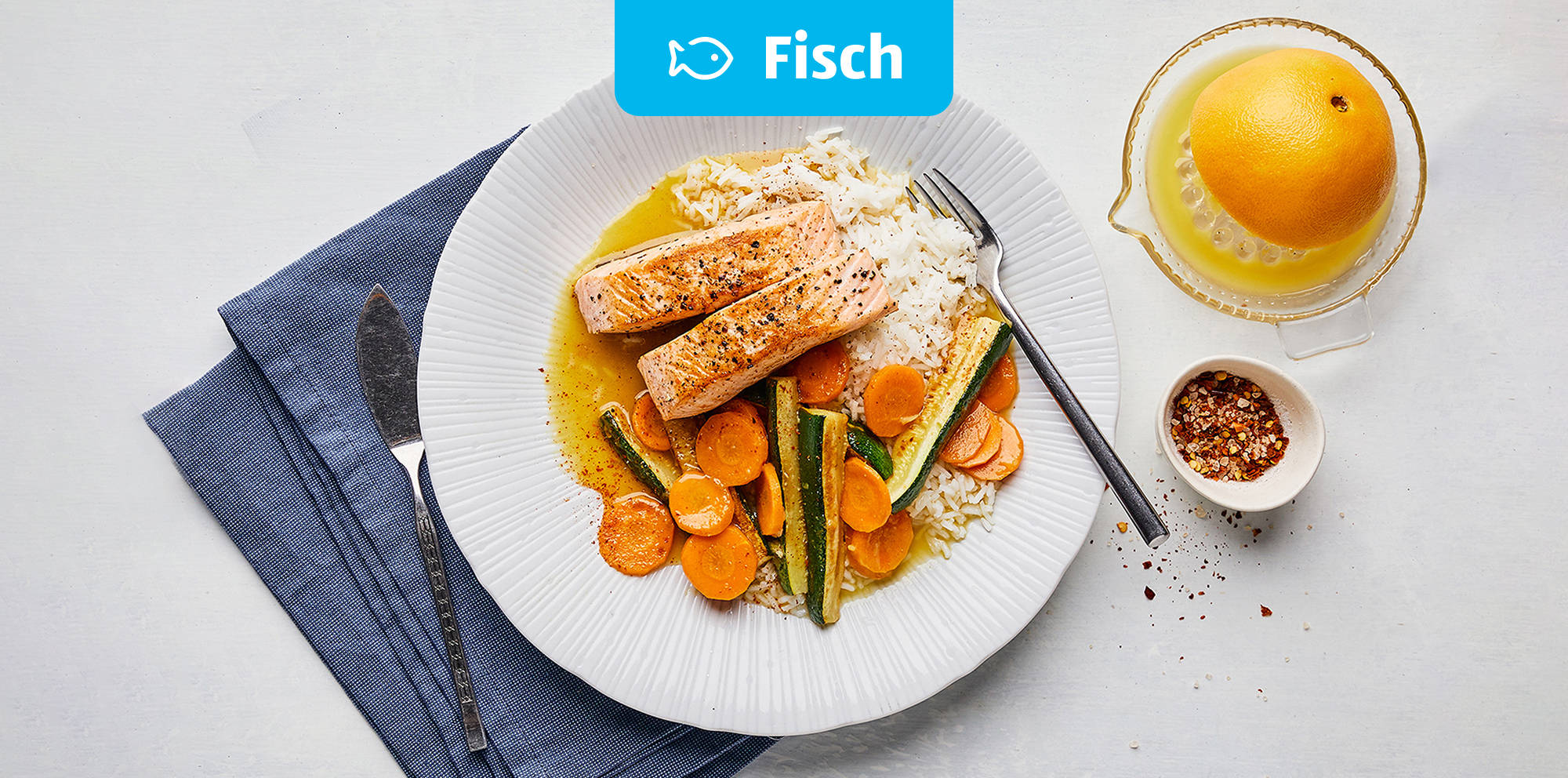 Lachs in Orangensauce mit Reis.