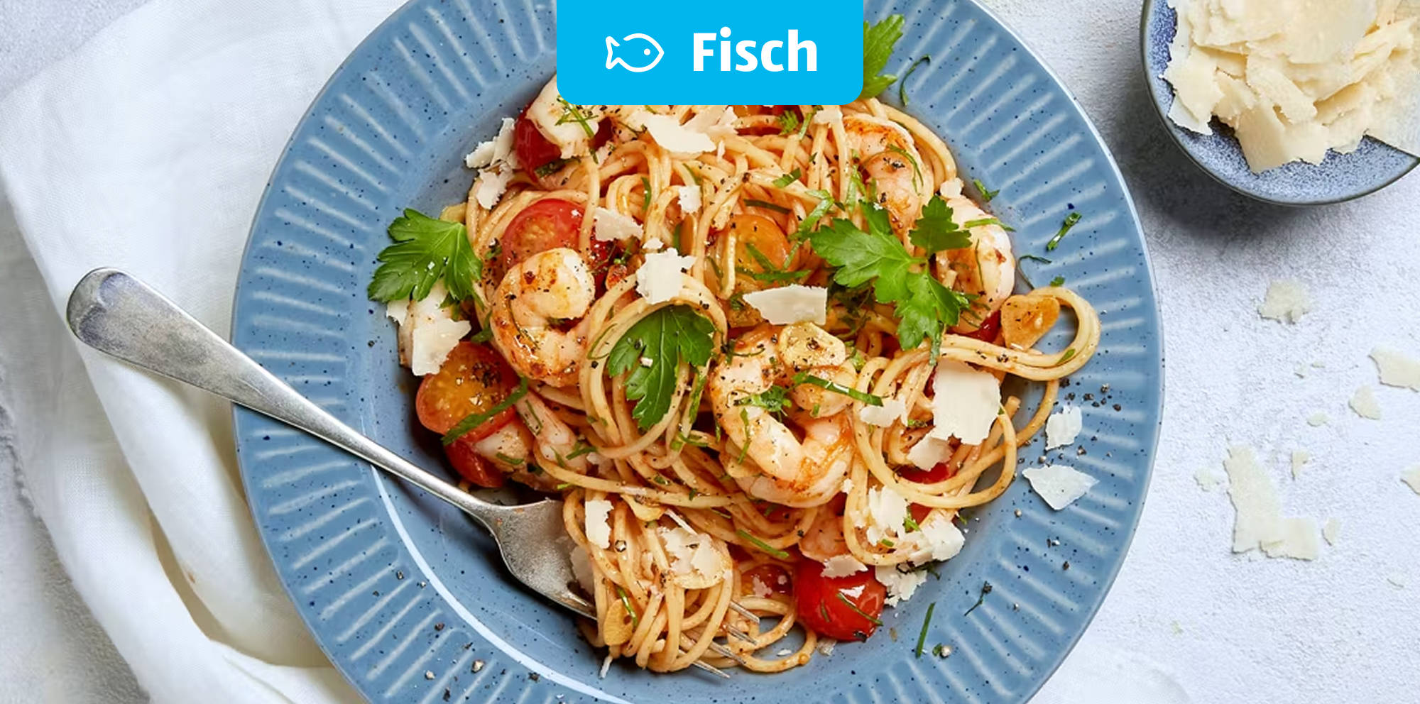 Gambas „Italia“ mit Spaghetti aglio olio mit Kirschtomaten.