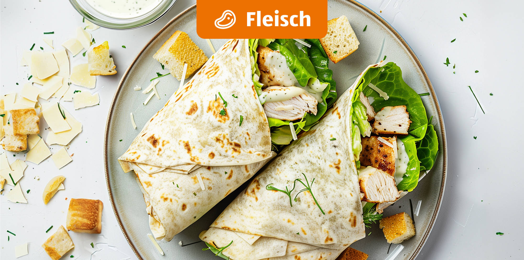 Chicken wraps with lettuce and croutons.