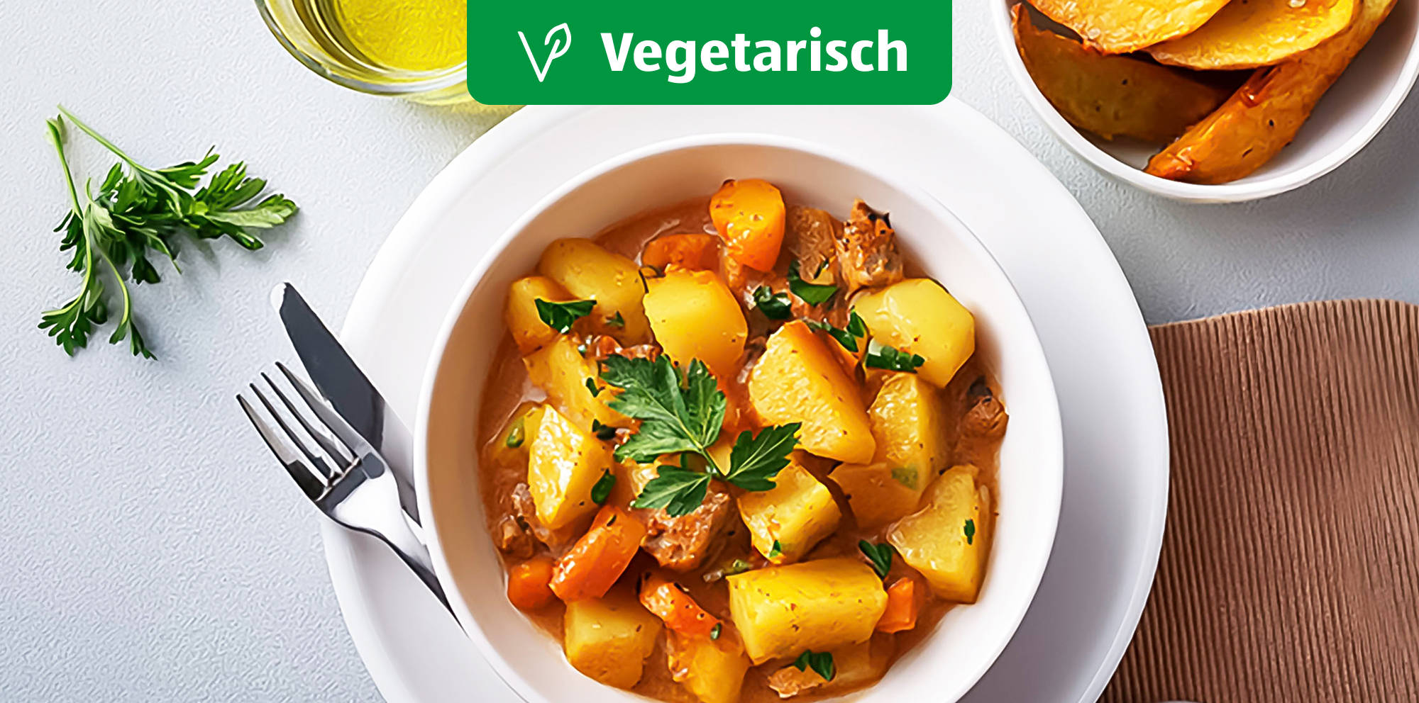 Cremiges Gemüse-Ragout mit knusprigen Kartoffelecken.