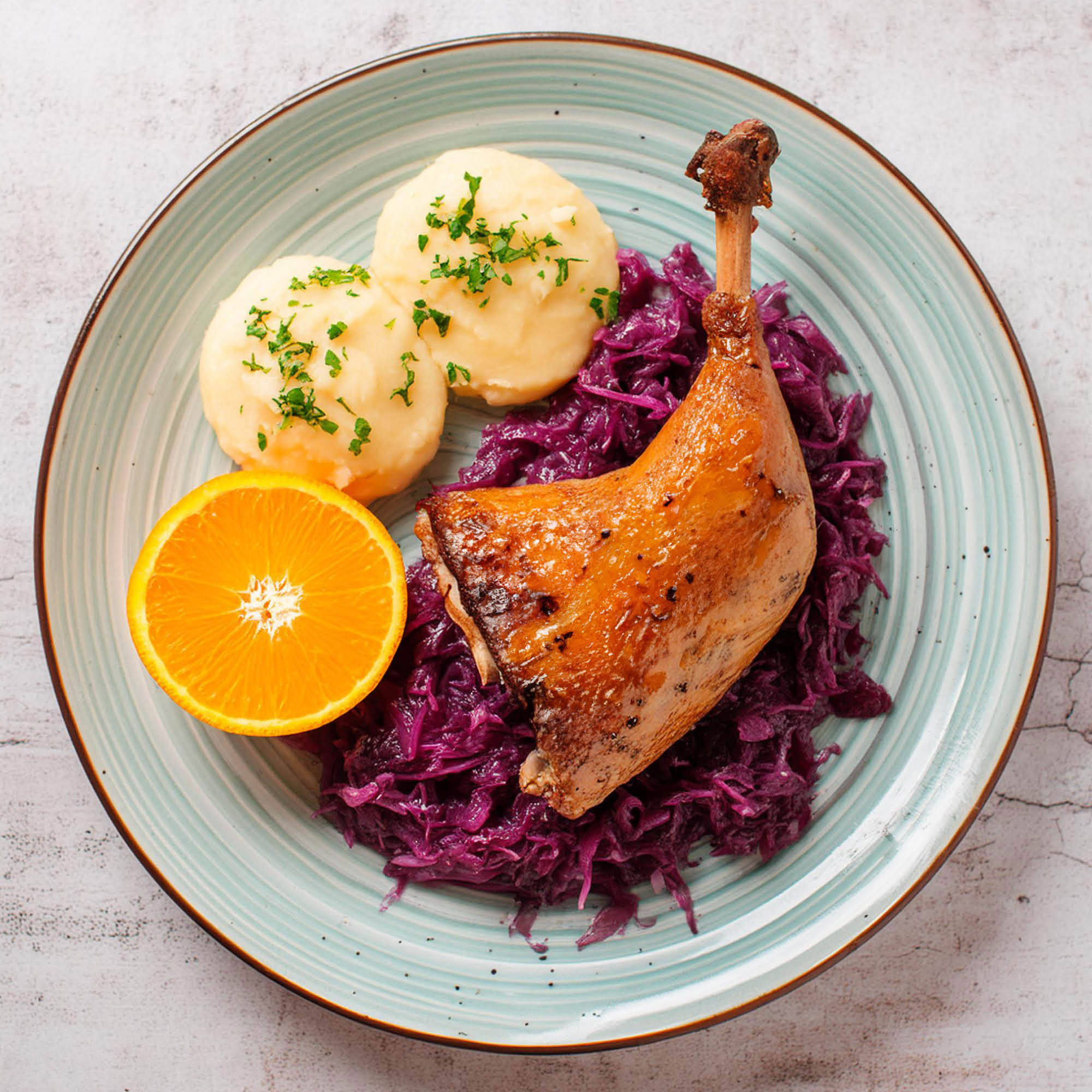 Gänsekeulen mit Orangenrotkohl