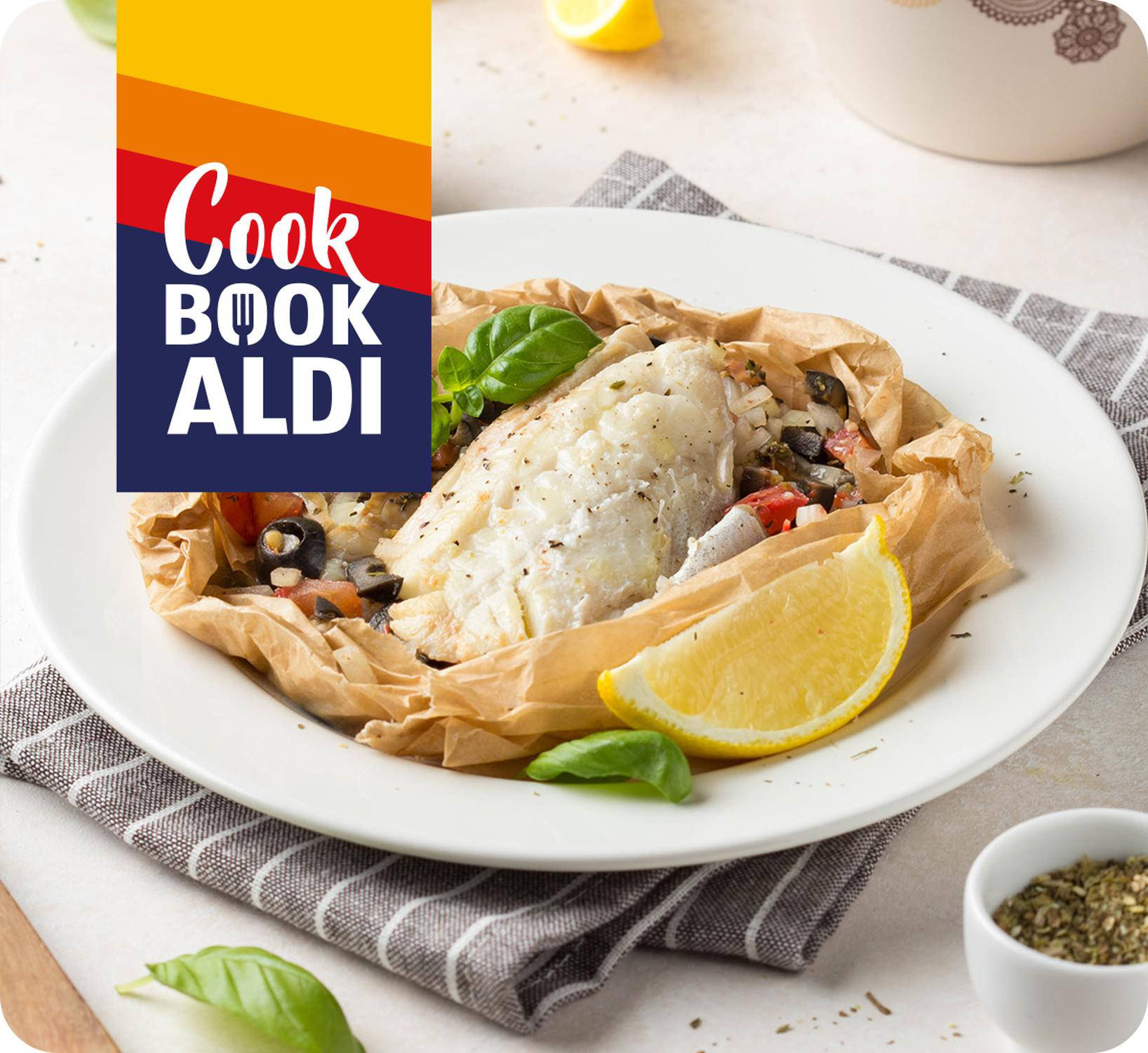 Filetti di branzino al cartoccio con patate, limone e olive