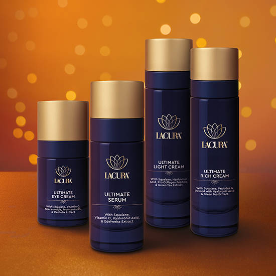 Lacura skincare products with golden accents