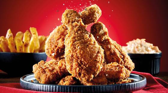 Southern fried chicken thighs and drums image